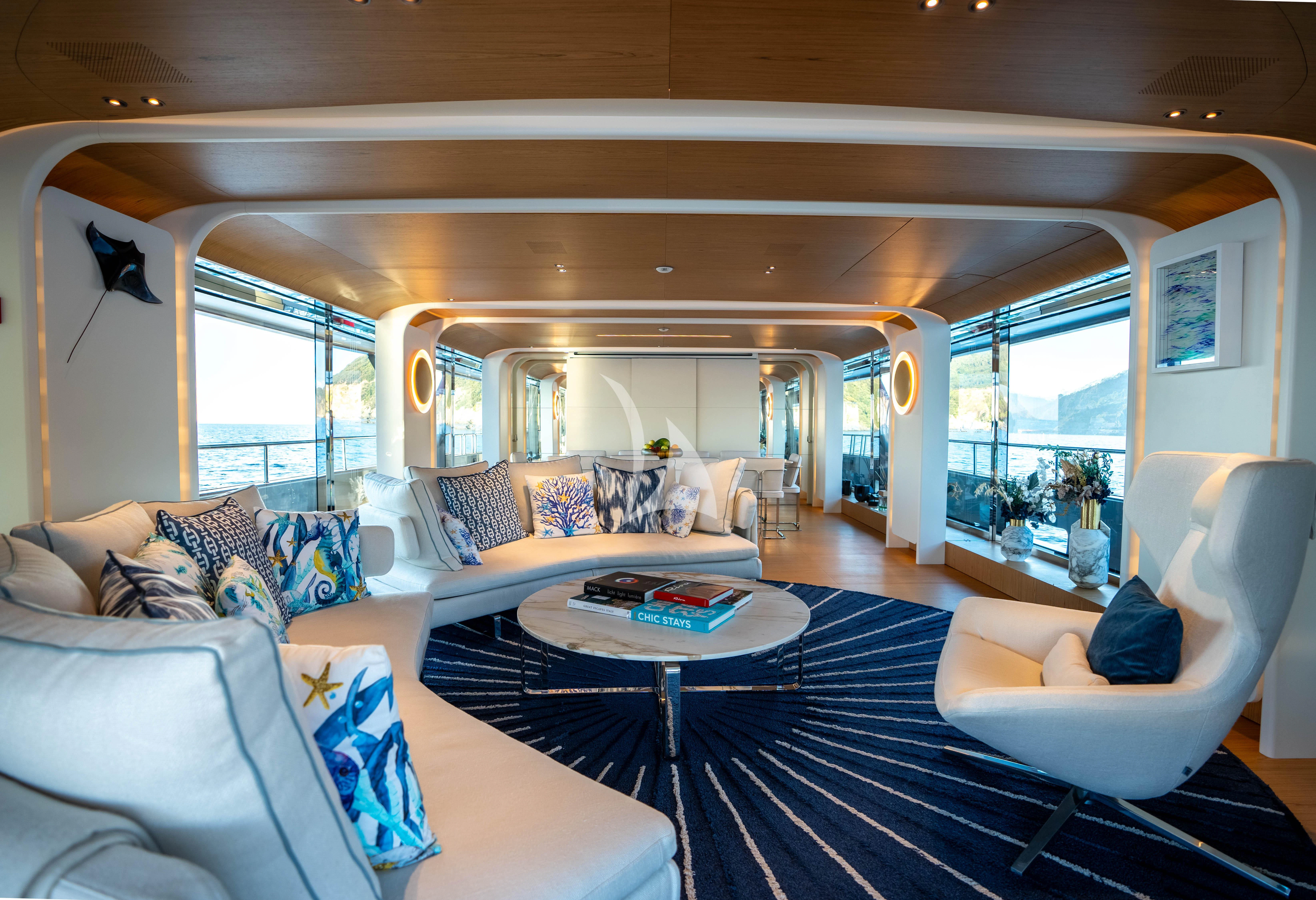 a living room with a large window aboard EH2 Yacht for Sale