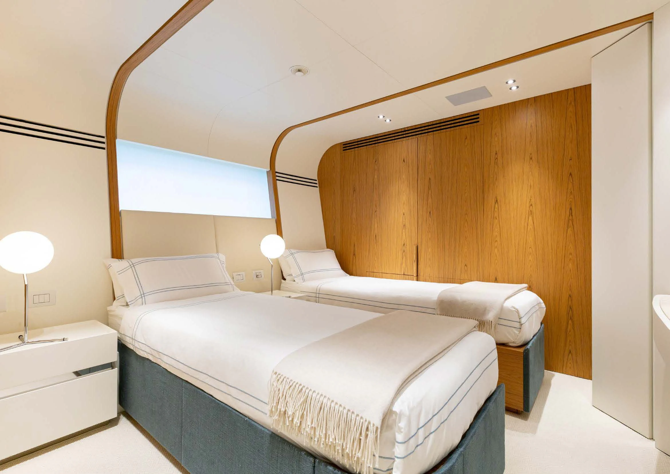 a room with two beds aboard EH2 Yacht for Sale