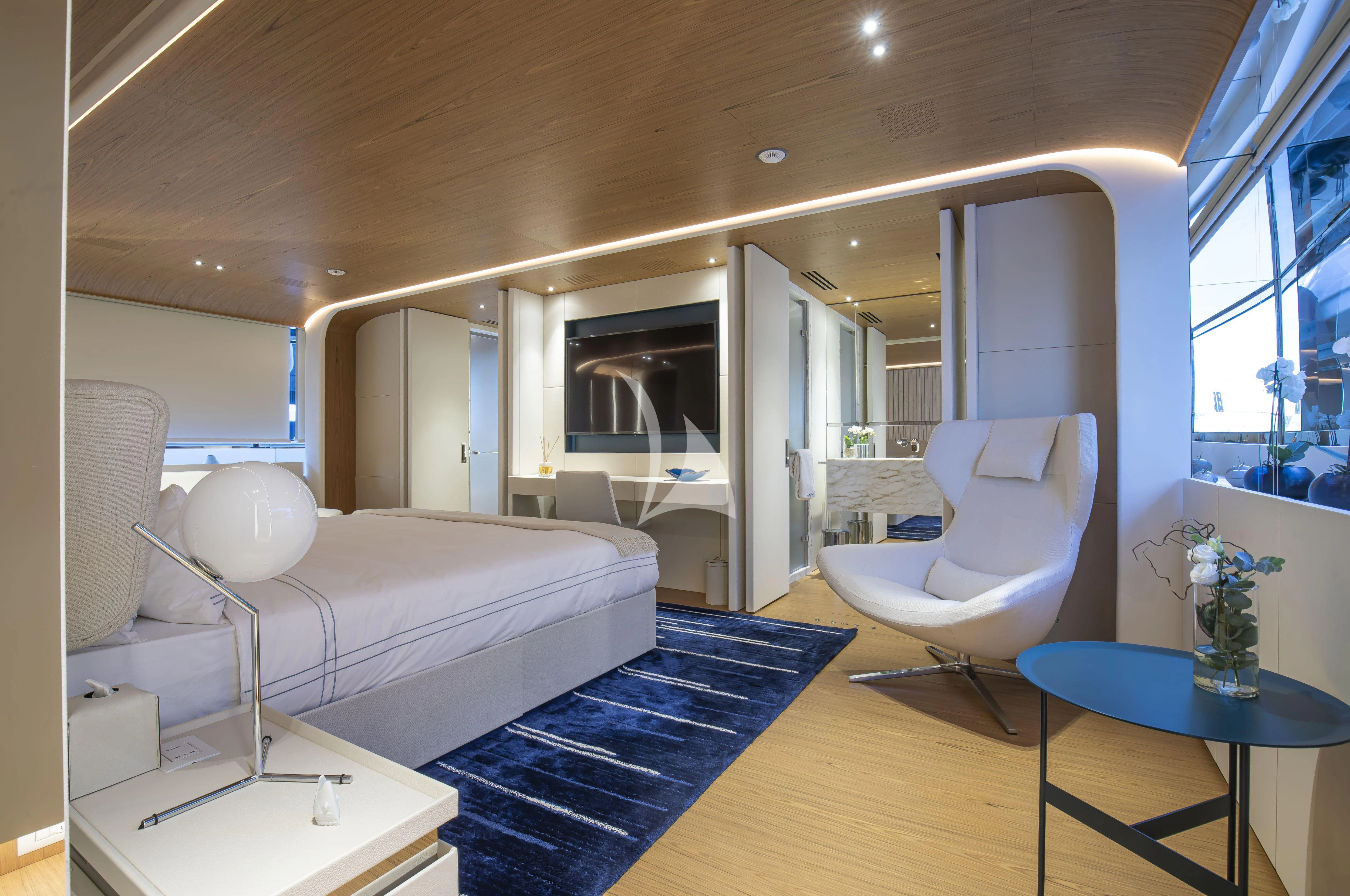 a modern looking bedroom aboard EH2 Yacht for Sale