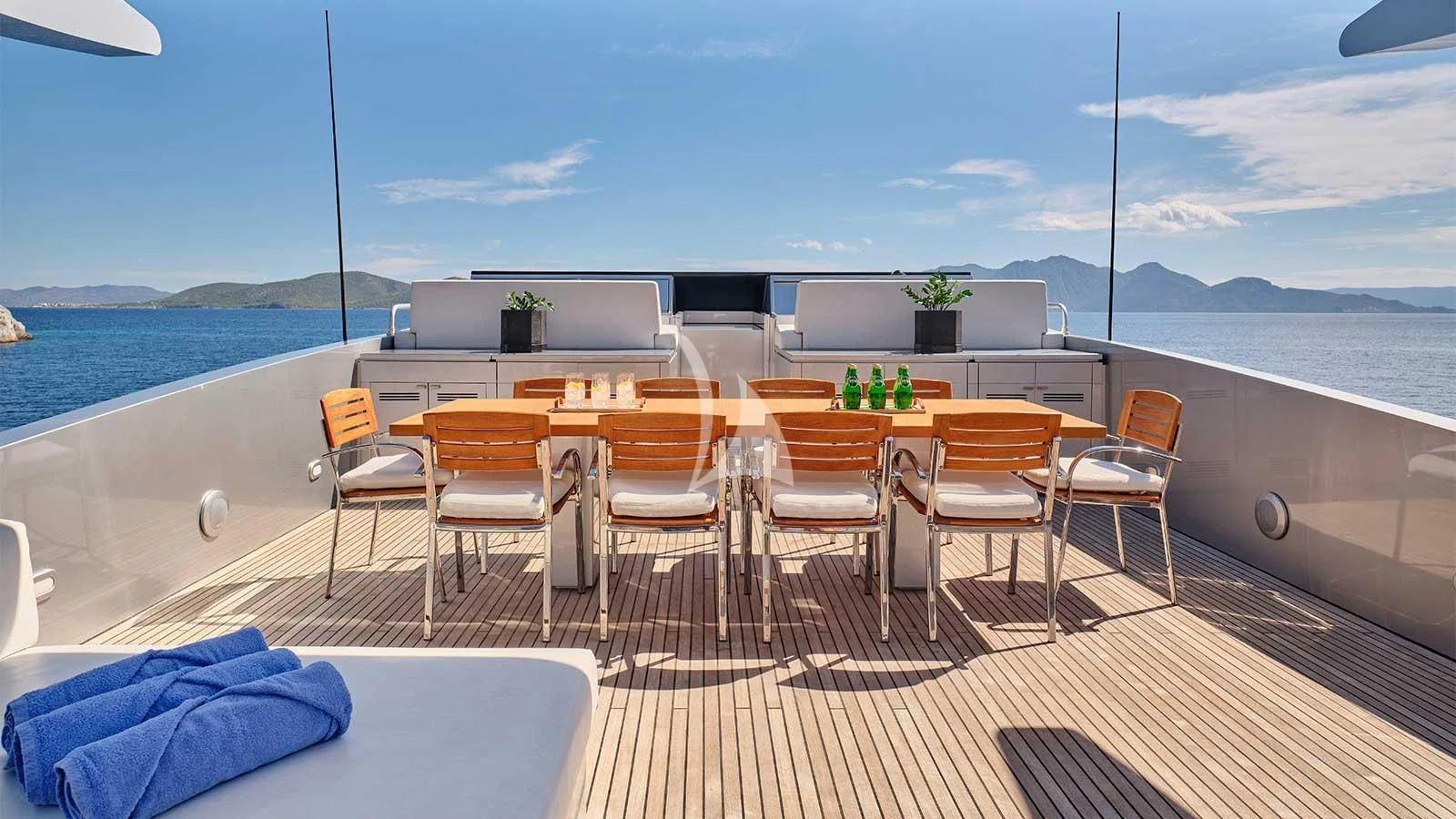 a room with a table and chairs aboard AMICI PER SEMPRE Yacht for Charter