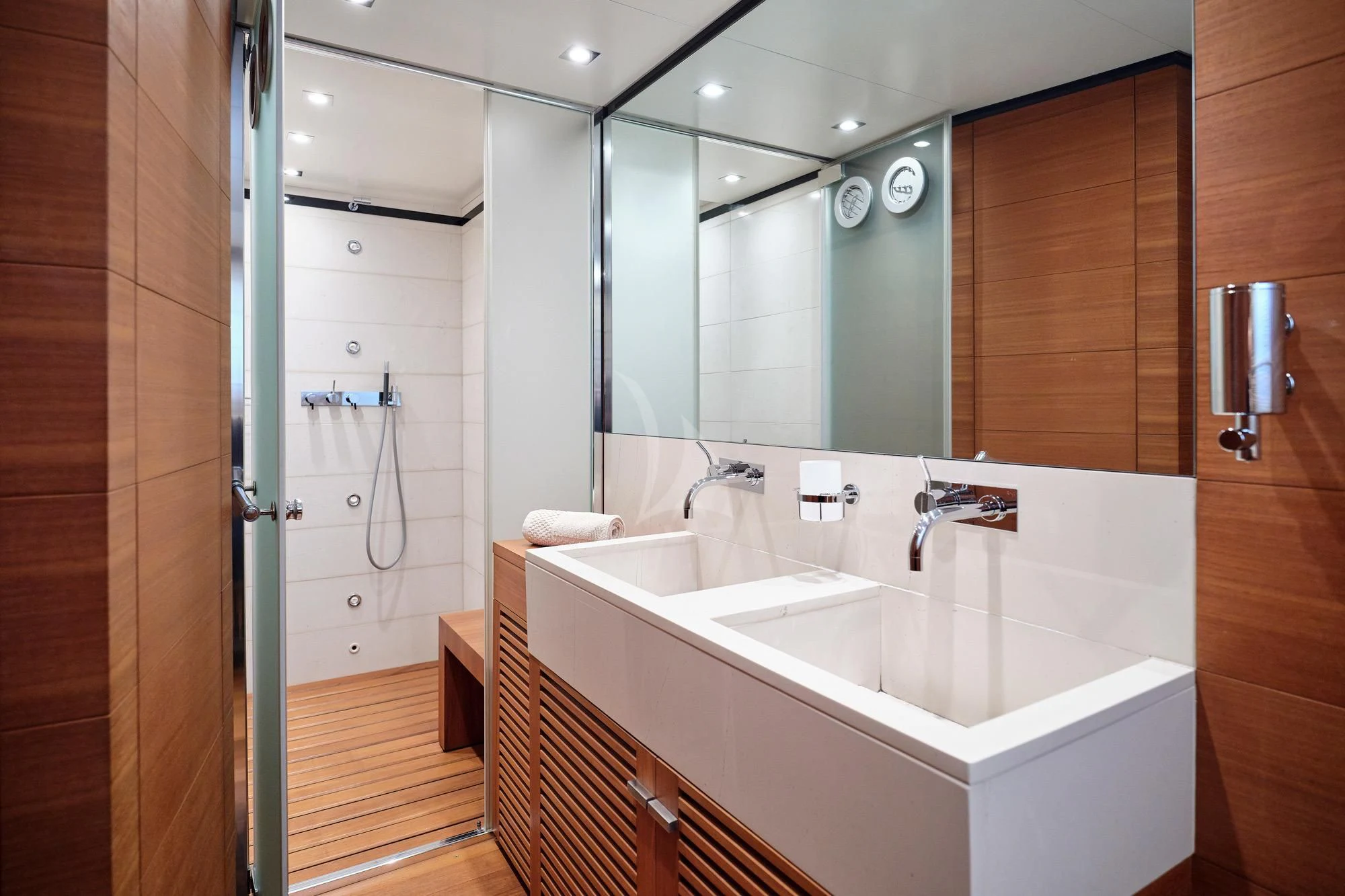a bathroom with a large mirror aboard AMICI PER SEMPRE Yacht for Charter