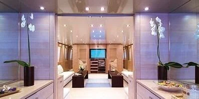 a room with a large glass wall aboard AMICI PER SEMPRE Yacht for Charter