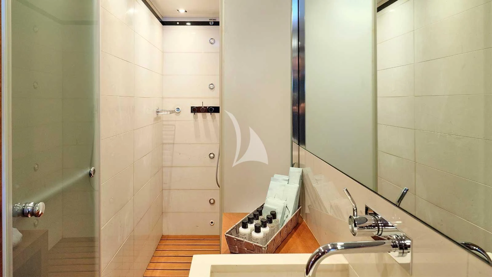 a bathroom with a sink and a mirror aboard AMICI PER SEMPRE Yacht for Charter