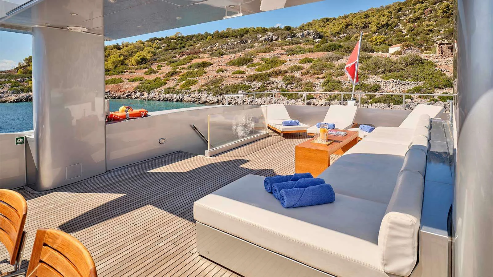 a room with a large window overlooking a body of water aboard AMICI PER SEMPRE Yacht for Charter