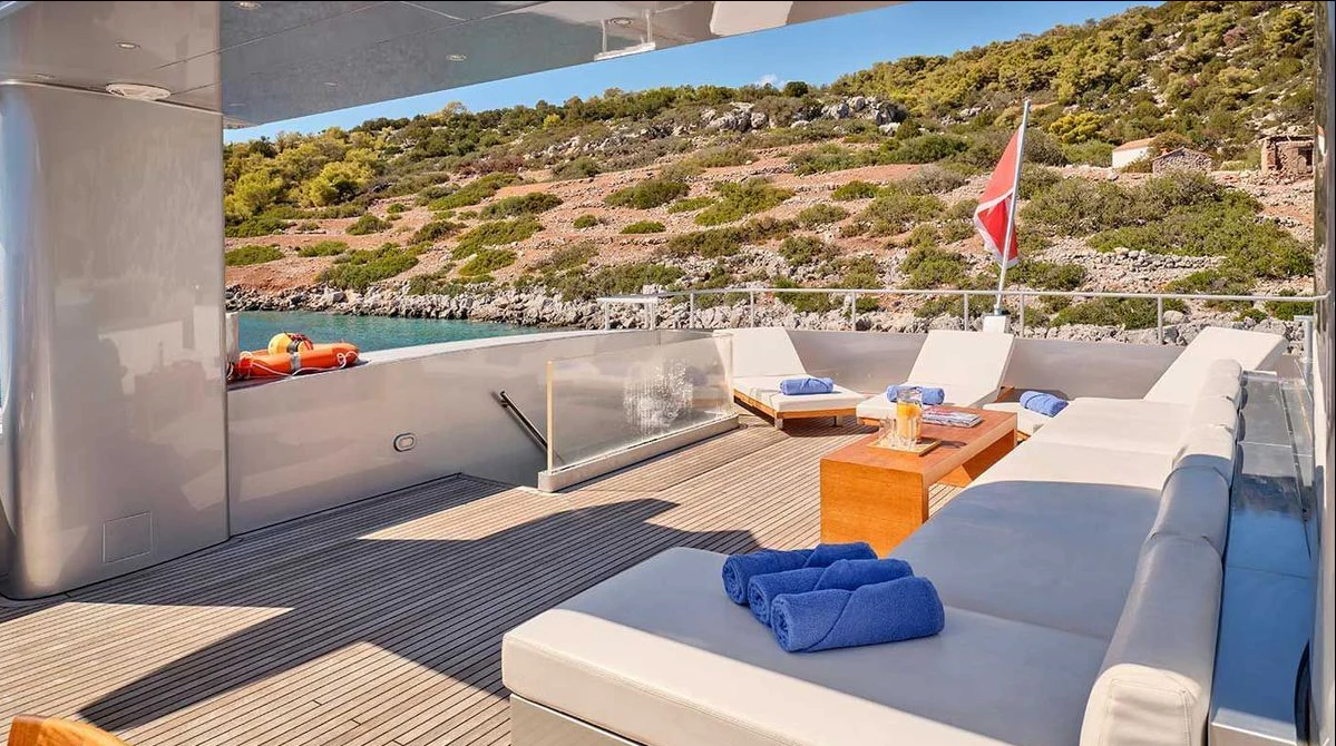 a room with a large patio and a pool aboard AMICI PER SEMPRE Yacht for Charter