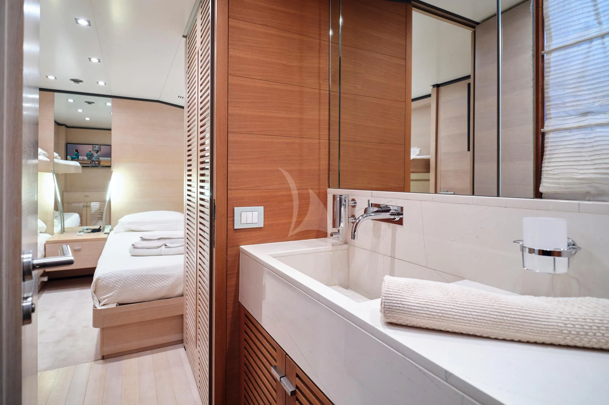 a bathroom with a large mirror aboard AMICI PER SEMPRE Yacht for Charter