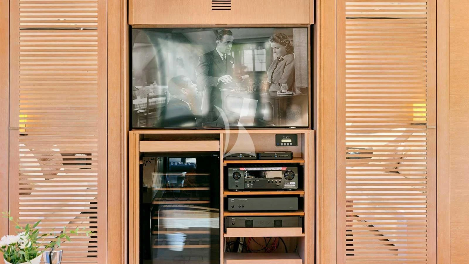 a tv on a stand aboard AMICI PER SEMPRE Yacht for Charter