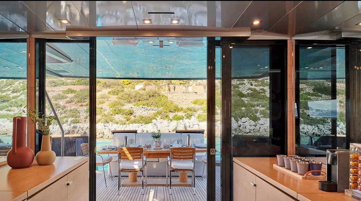 a room with a large window aboard AMICI PER SEMPRE Yacht for Charter