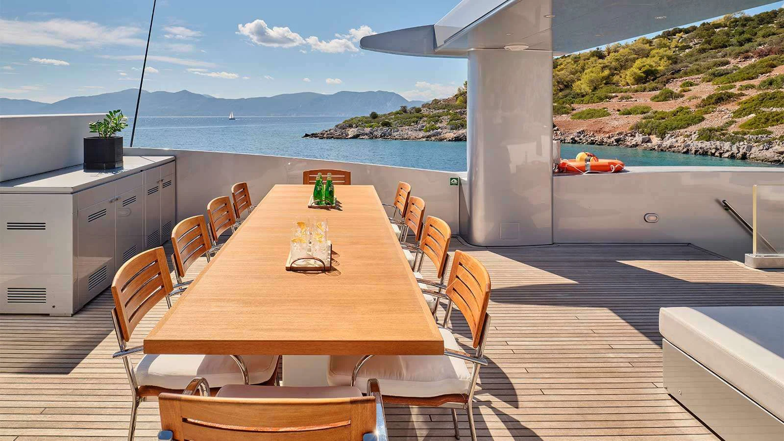 a table set for a meal aboard AMICI PER SEMPRE Yacht for Charter