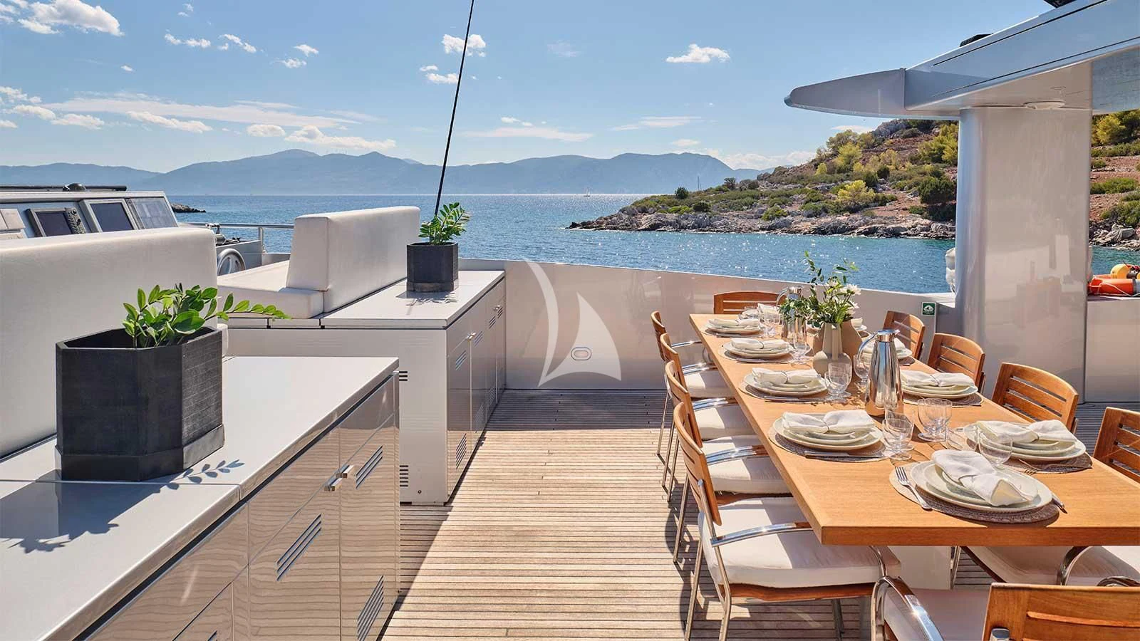 a table set for a meal aboard AMICI PER SEMPRE Yacht for Charter