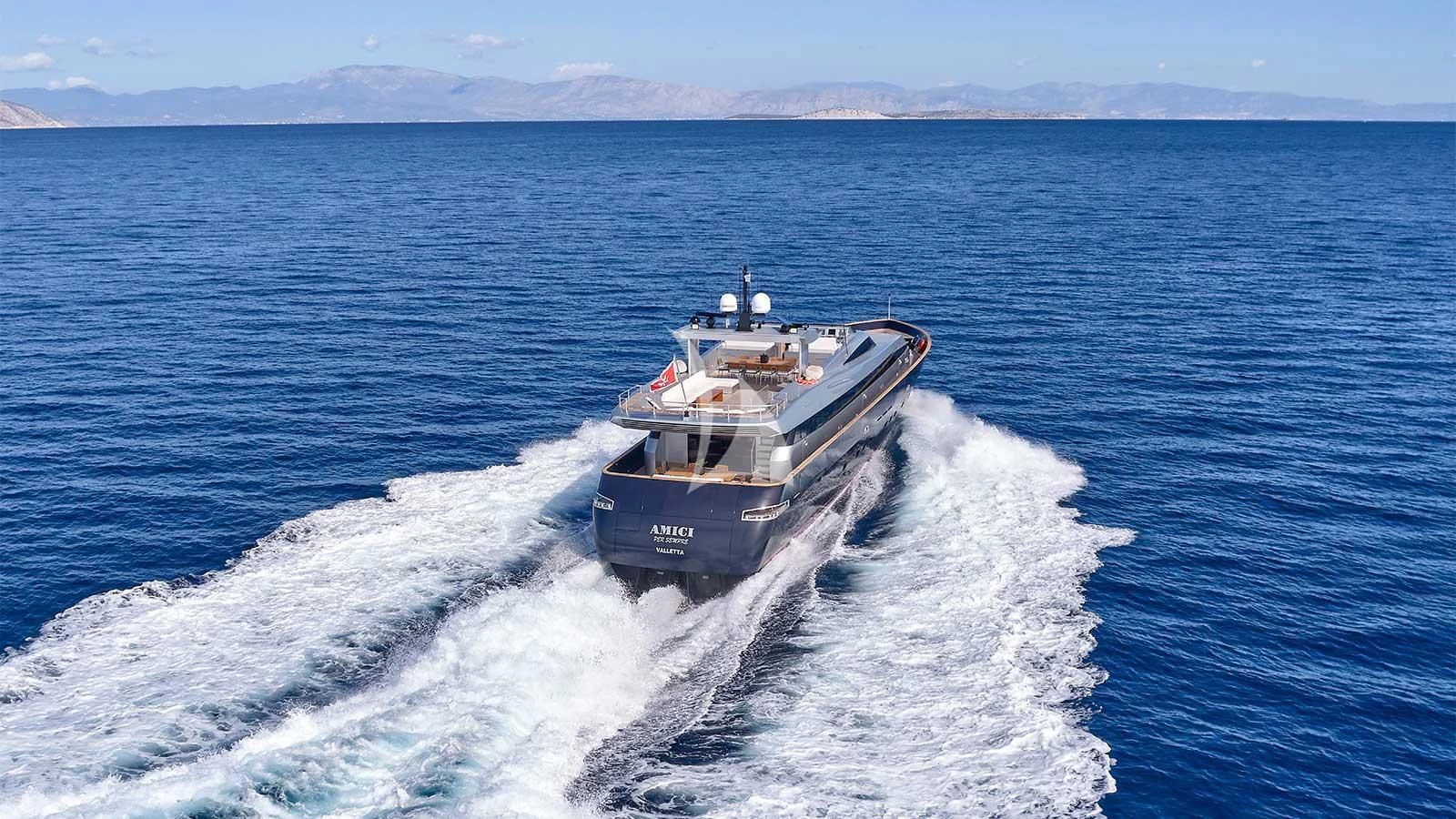a boat on the water aboard AMICI PER SEMPRE Yacht for Charter
