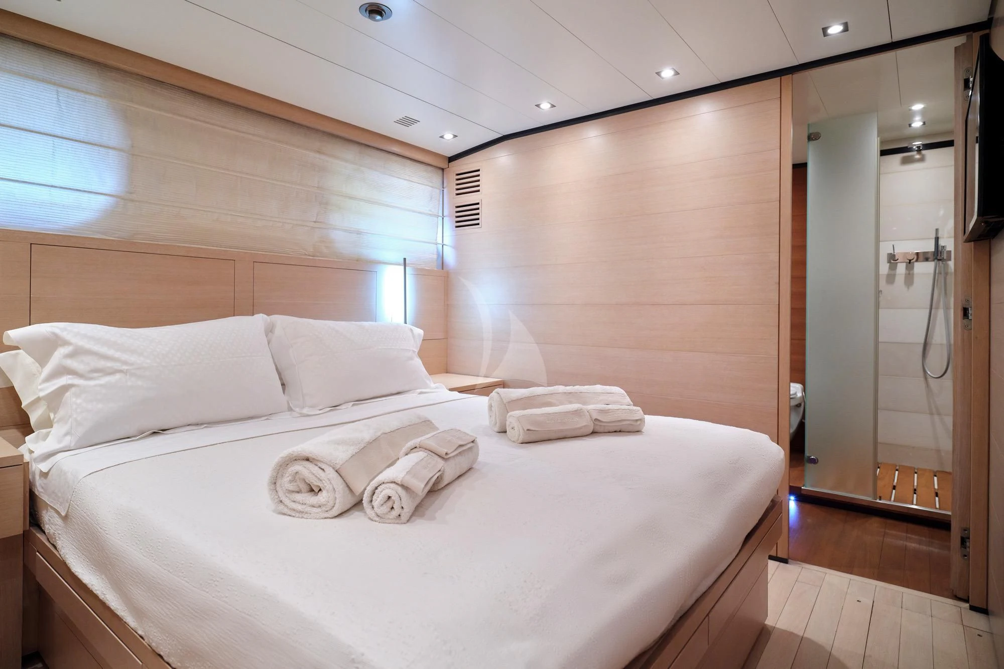 a bed in a room aboard AMICI PER SEMPRE Yacht for Charter
