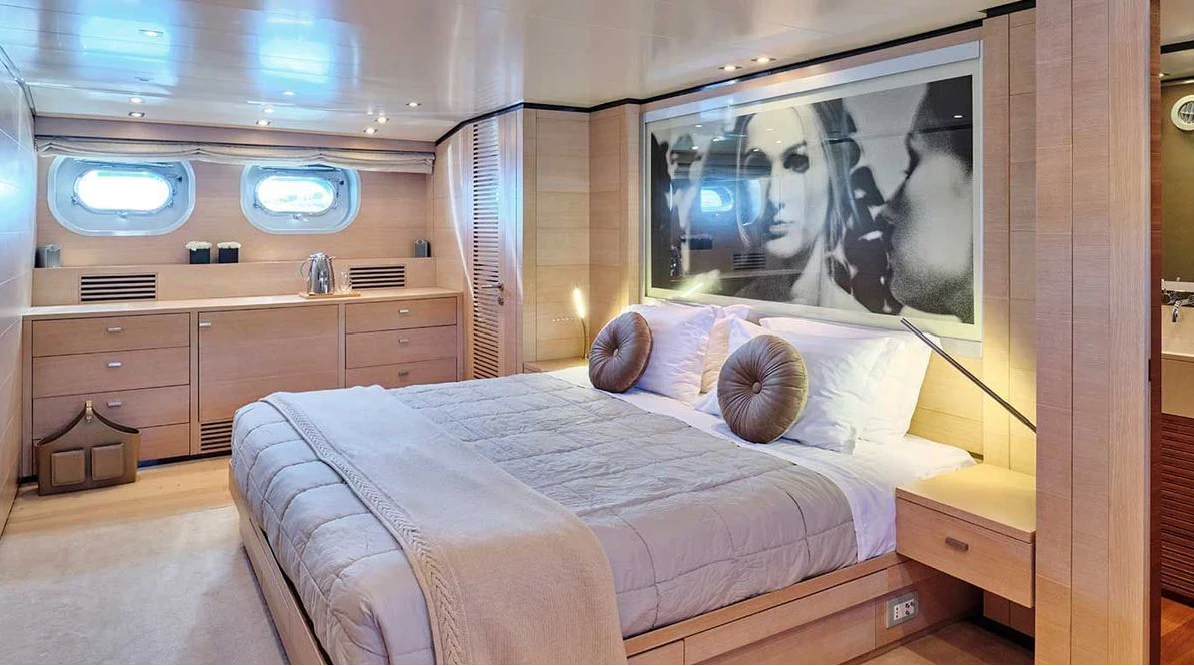 a bed in a room aboard AMICI PER SEMPRE Yacht for Charter