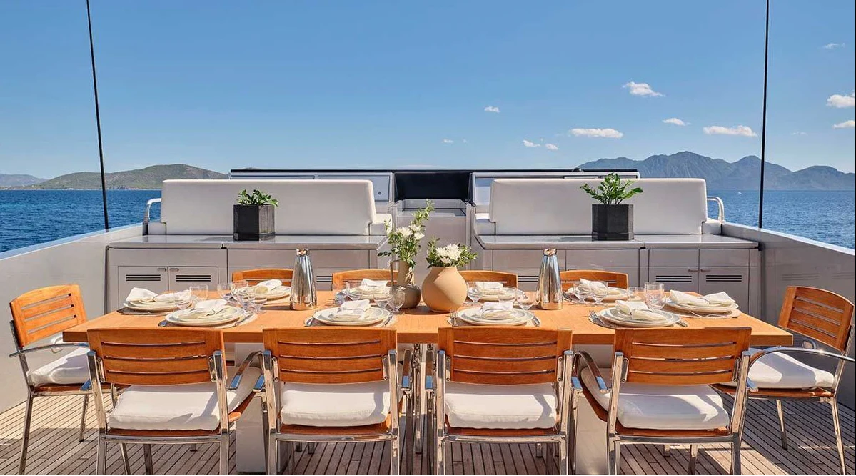 a table set for a meal aboard AMICI PER SEMPRE Yacht for Charter