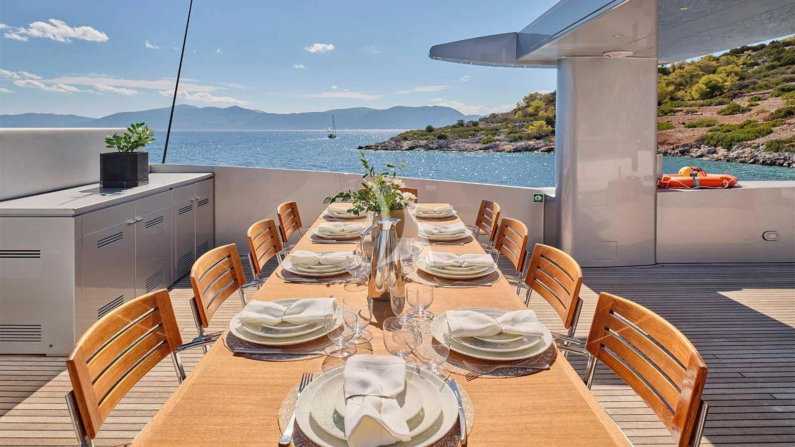 a table set for a meal aboard AMICI PER SEMPRE Yacht for Charter