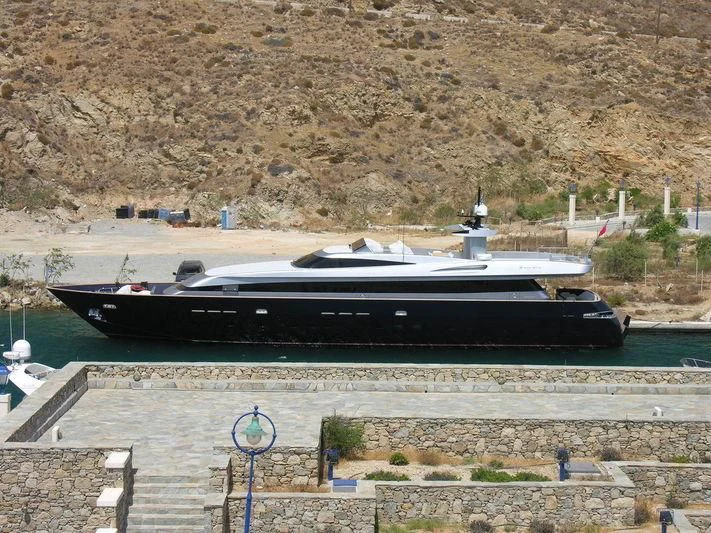 a large boat in a body of water aboard AMICI PER SEMPRE Yacht for Charter