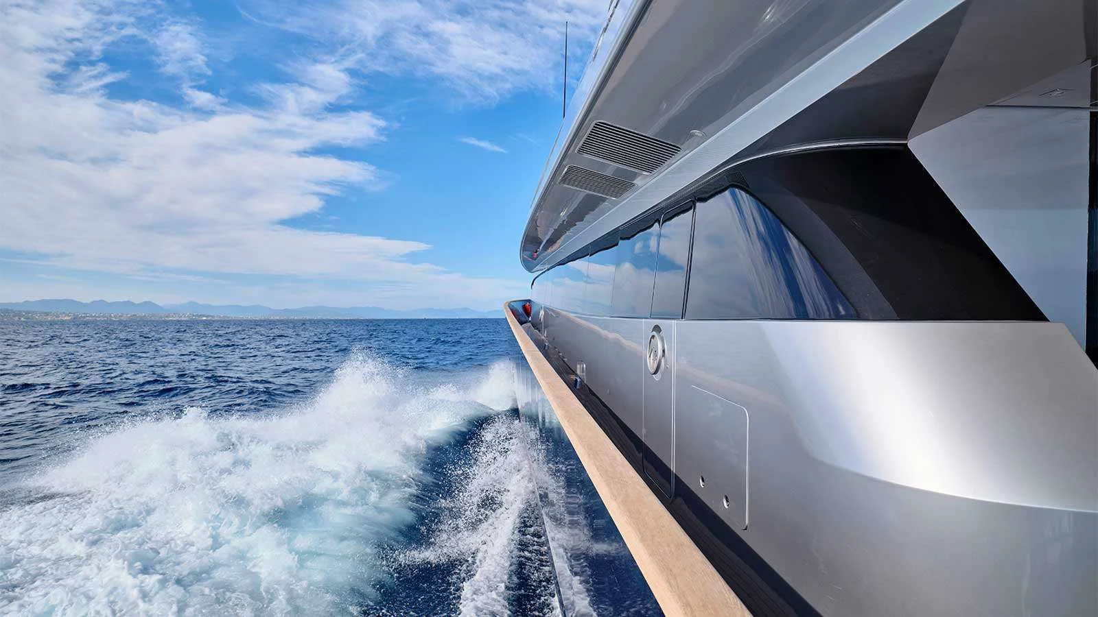 a plane flying over the ocean aboard AMICI PER SEMPRE Yacht for Charter