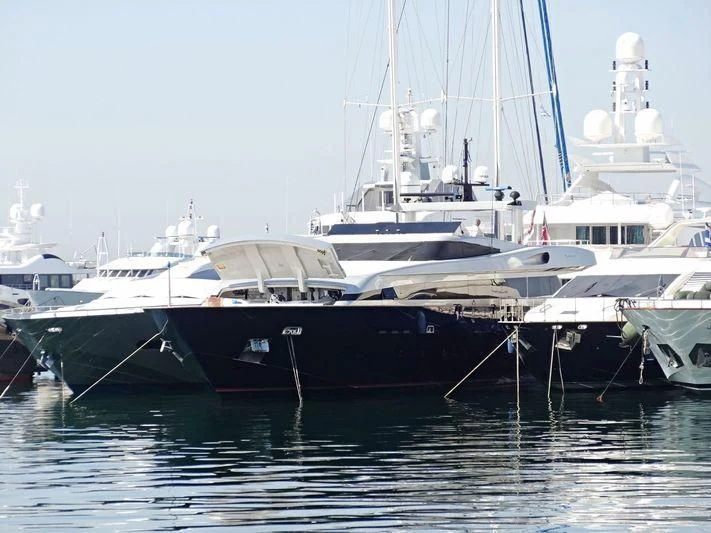 several boats docked in a harbor aboard AMICI PER SEMPRE Yacht for Charter