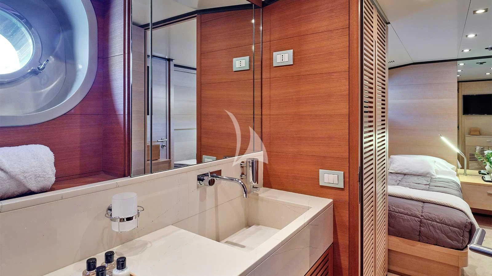 a bathroom with a large mirror aboard AMICI PER SEMPRE Yacht for Charter