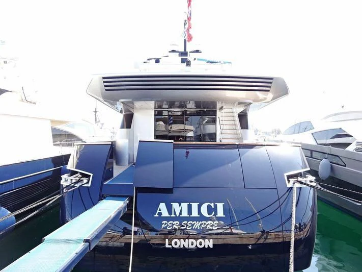 a boat docked at a pier aboard AMICI PER SEMPRE Yacht for Charter