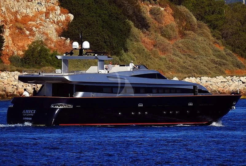 a large boat in the water aboard AMICI PER SEMPRE Yacht for Charter