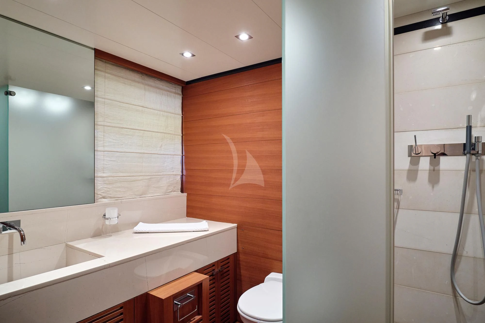 a bathroom with a sink and a shower aboard AMICI PER SEMPRE Yacht for Charter