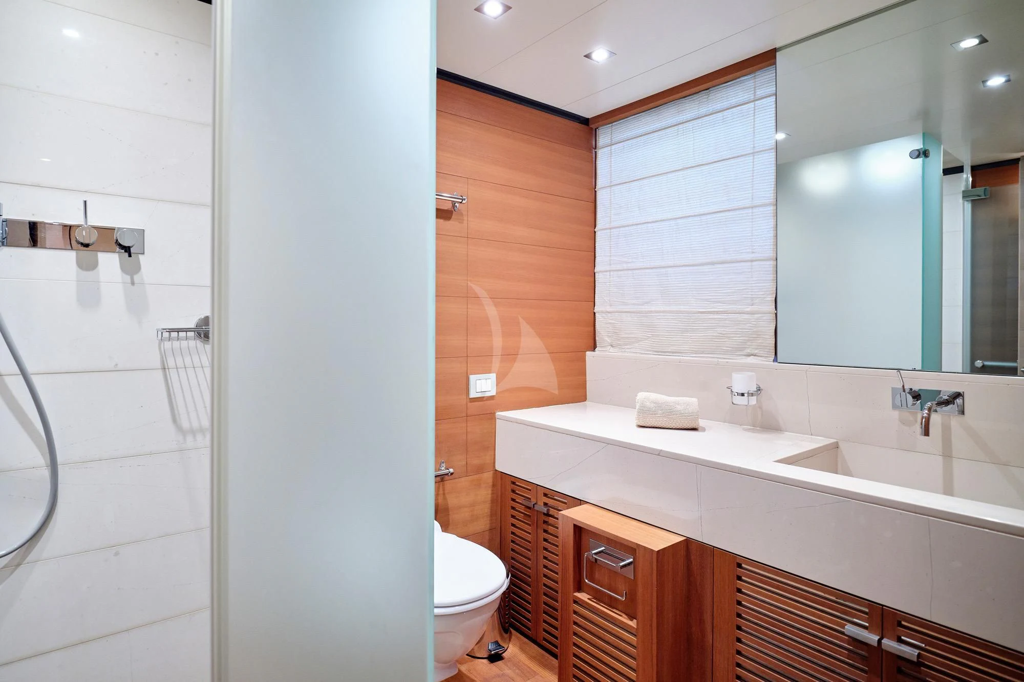 a bathroom with a sink and a shower aboard AMICI PER SEMPRE Yacht for Charter