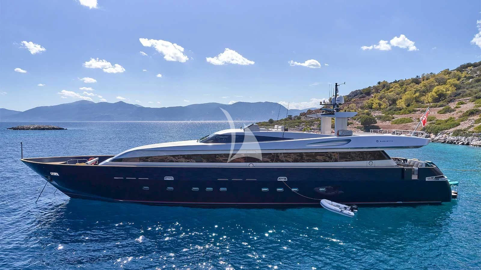 a large ship in the water aboard AMICI PER SEMPRE Yacht for Charter