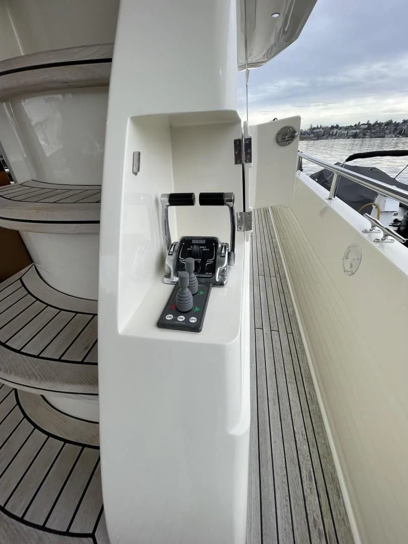 a white vehicle with a black object on the back aboard MIA AND MAUI JIM Yacht for Sale