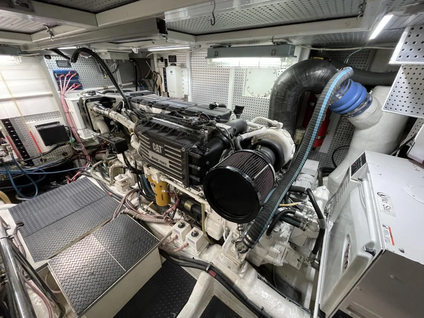 a close-up of a car engine aboard MIA AND MAUI JIM Yacht for Sale