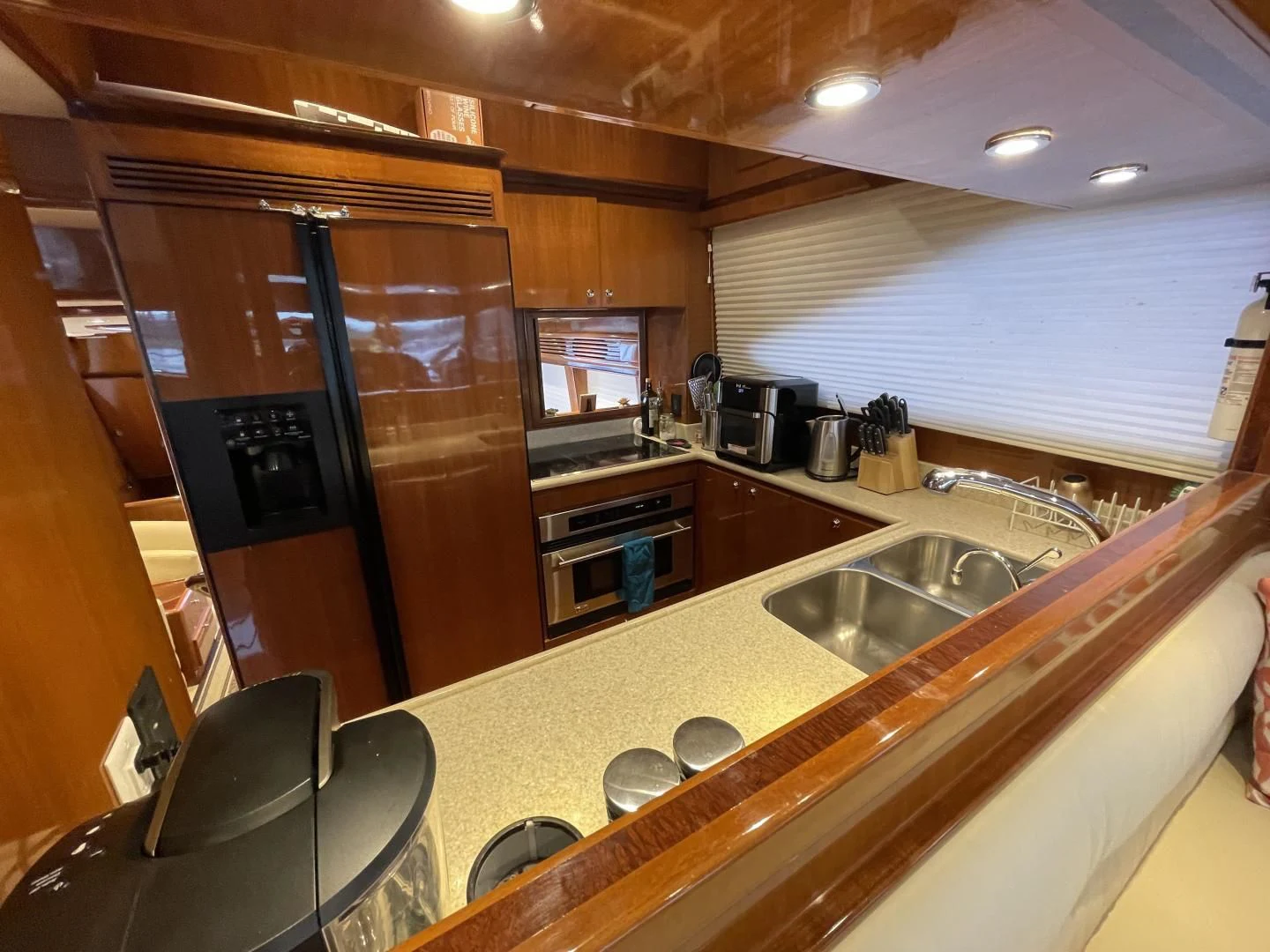a kitchen with a large island aboard MIA AND MAUI JIM Yacht for Sale