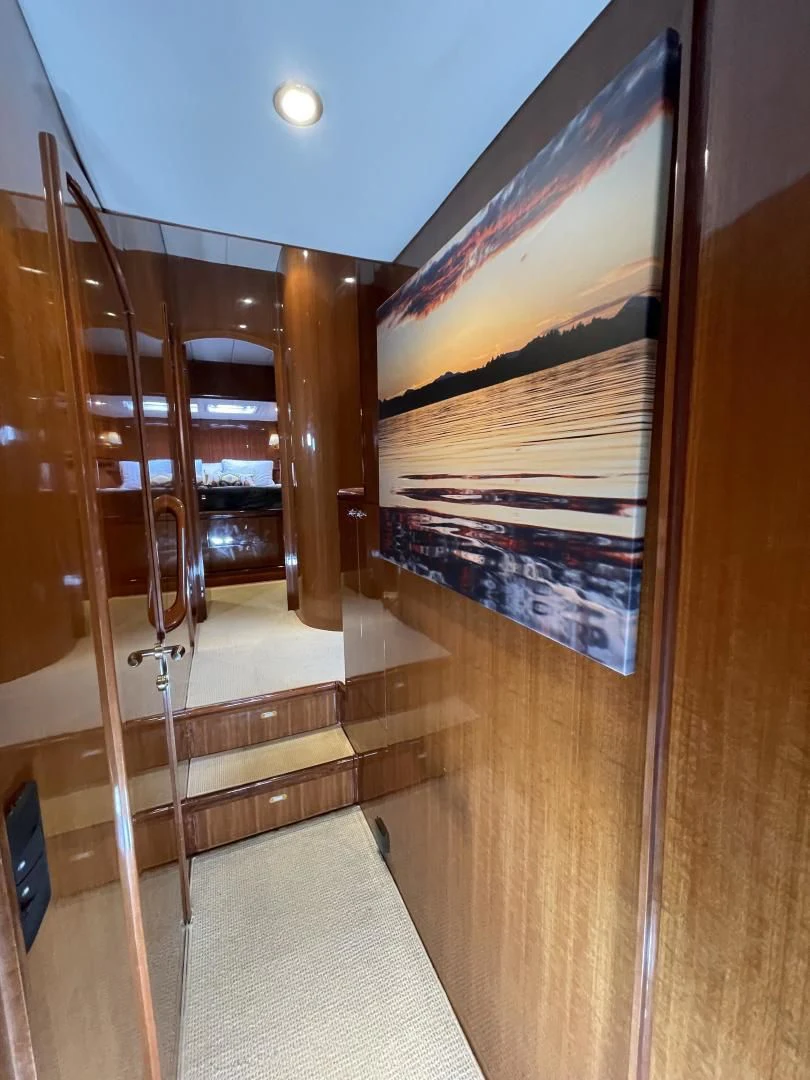 a room with a glass door aboard MIA AND MAUI JIM Yacht for Sale