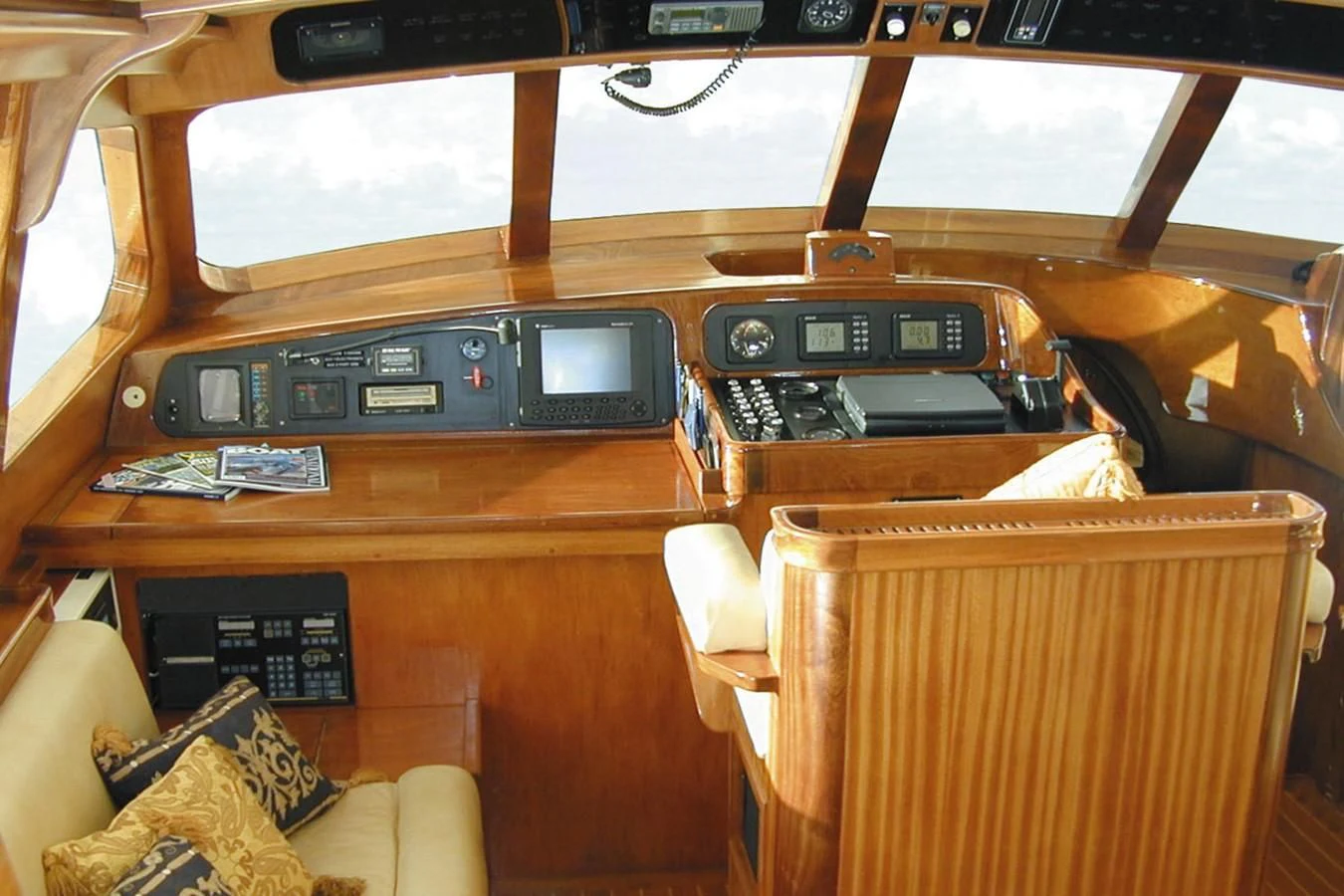 a group of electronics on a table aboard AURASTEL Yacht for Sale