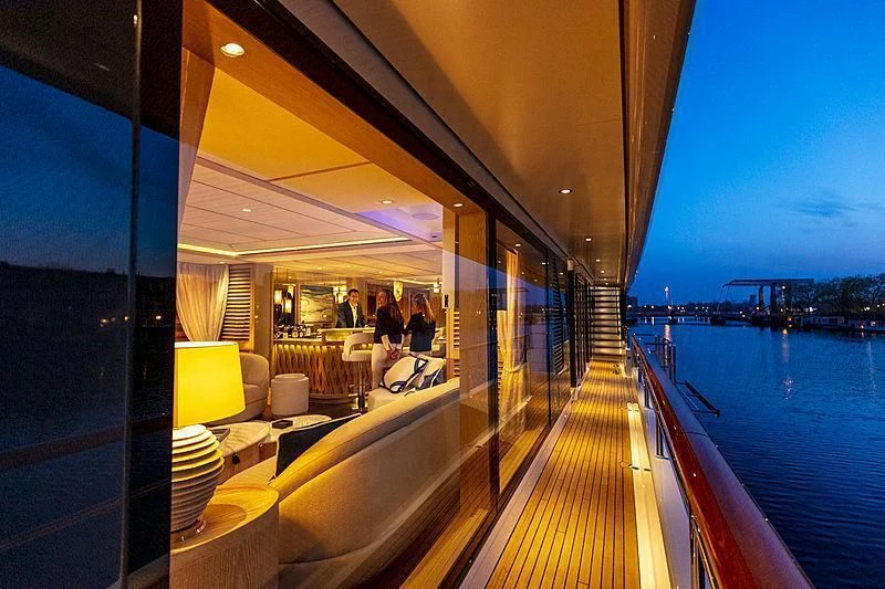 a deck with a view of the city and water aboard CALYPSO I Yacht for Charter