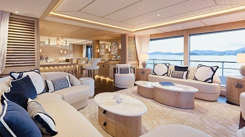 a living room with a large window aboard CALYPSO I Yacht for Charter