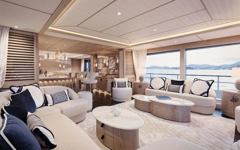 a living room with a large window aboard CALYPSO I Yacht for Charter