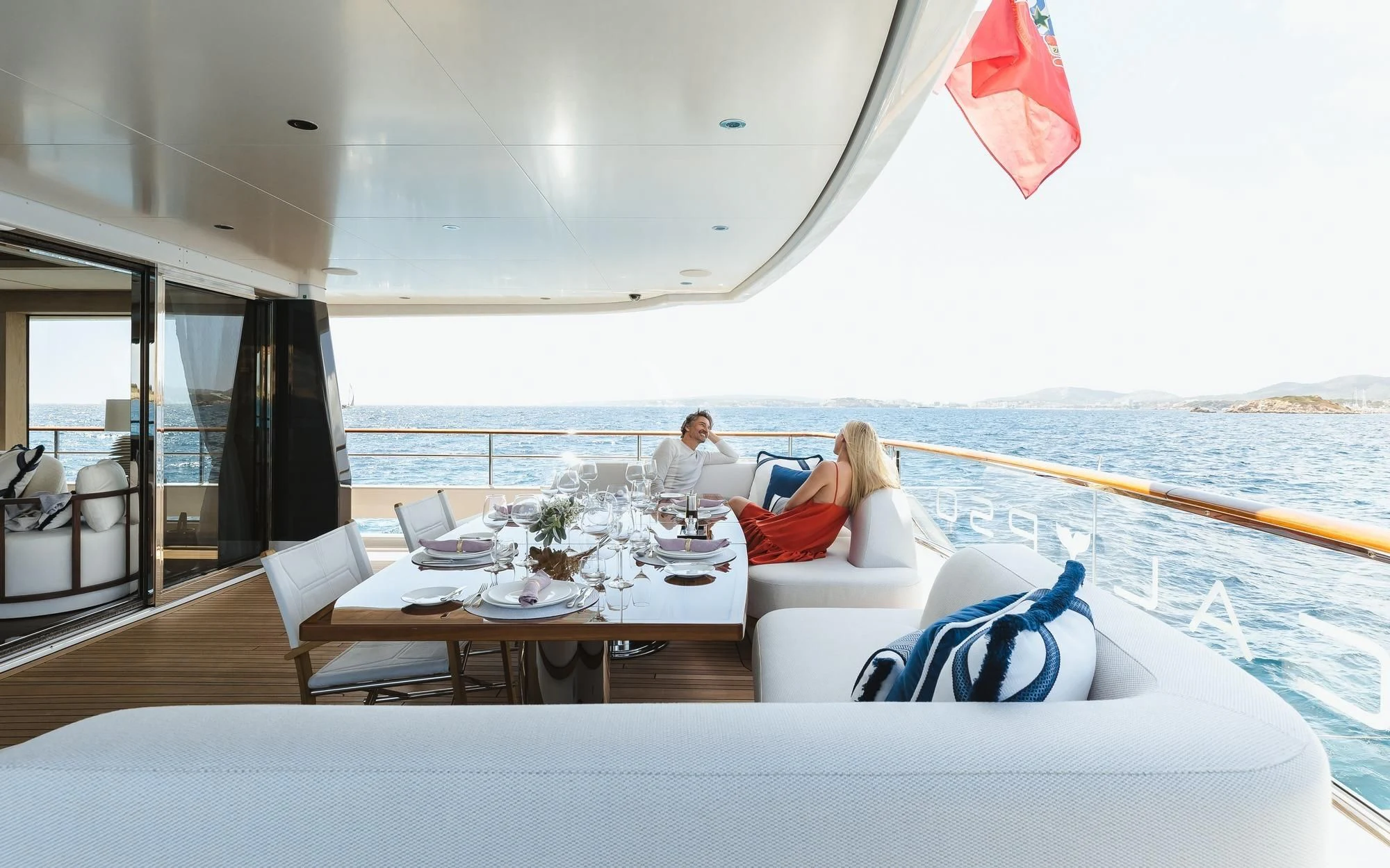 a couple sitting on a yacht aboard CALYPSO I Yacht for Charter