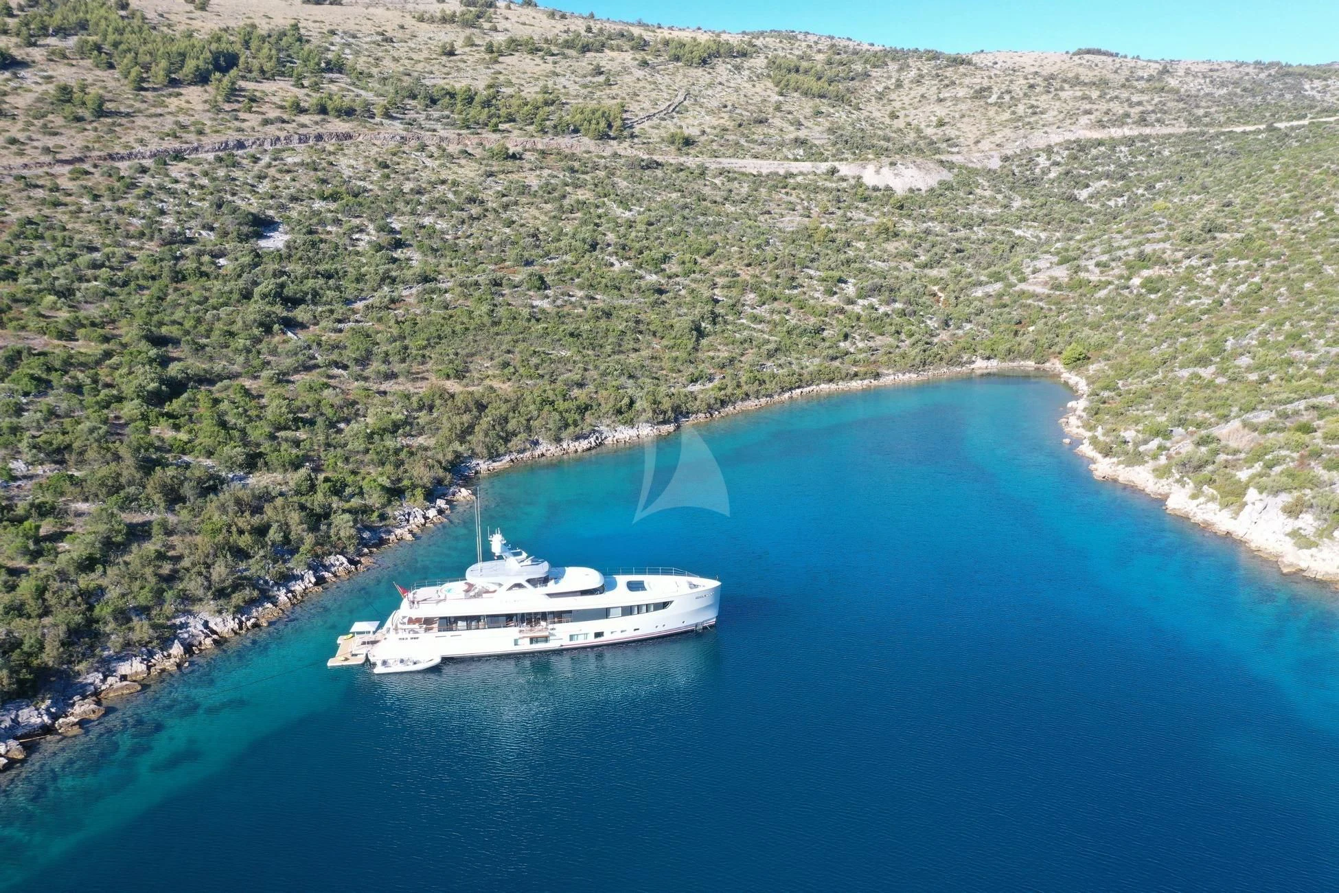 a boat sailing on a body of water aboard CALYPSO I Yacht for Charter