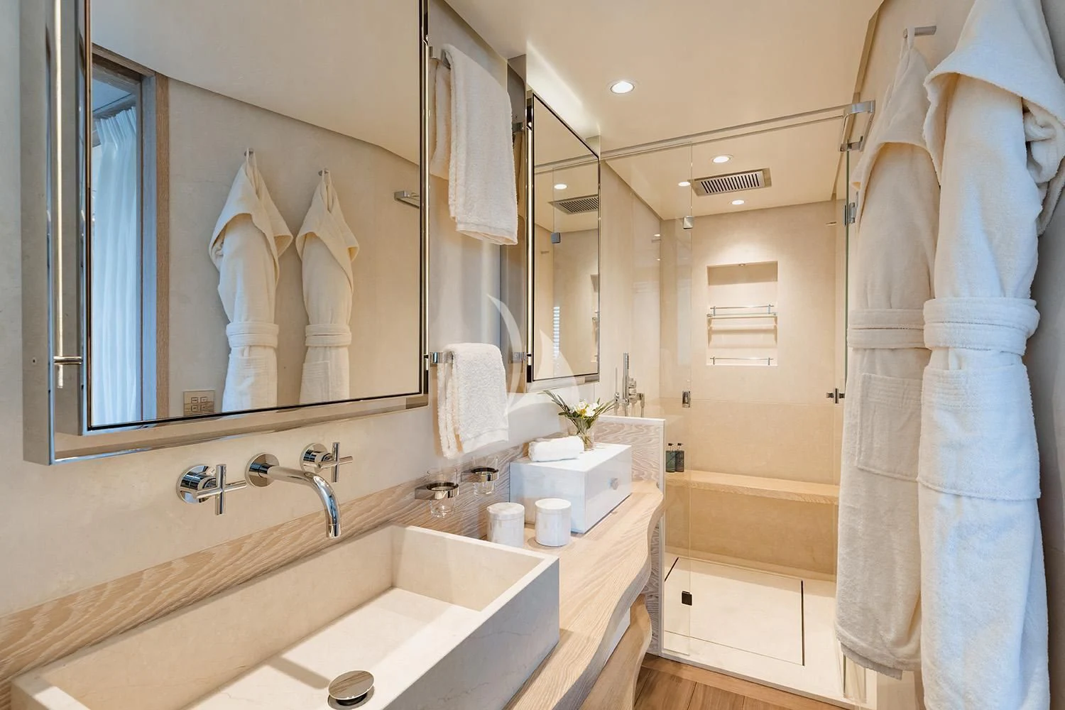 a bathroom with a large mirror aboard CALYPSO I Yacht for Charter