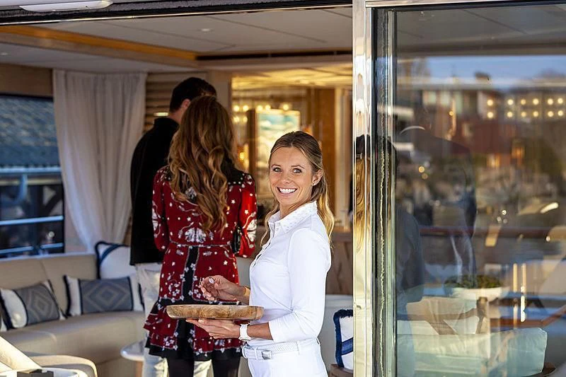 a couple of women smiling aboard CALYPSO I Yacht for Charter