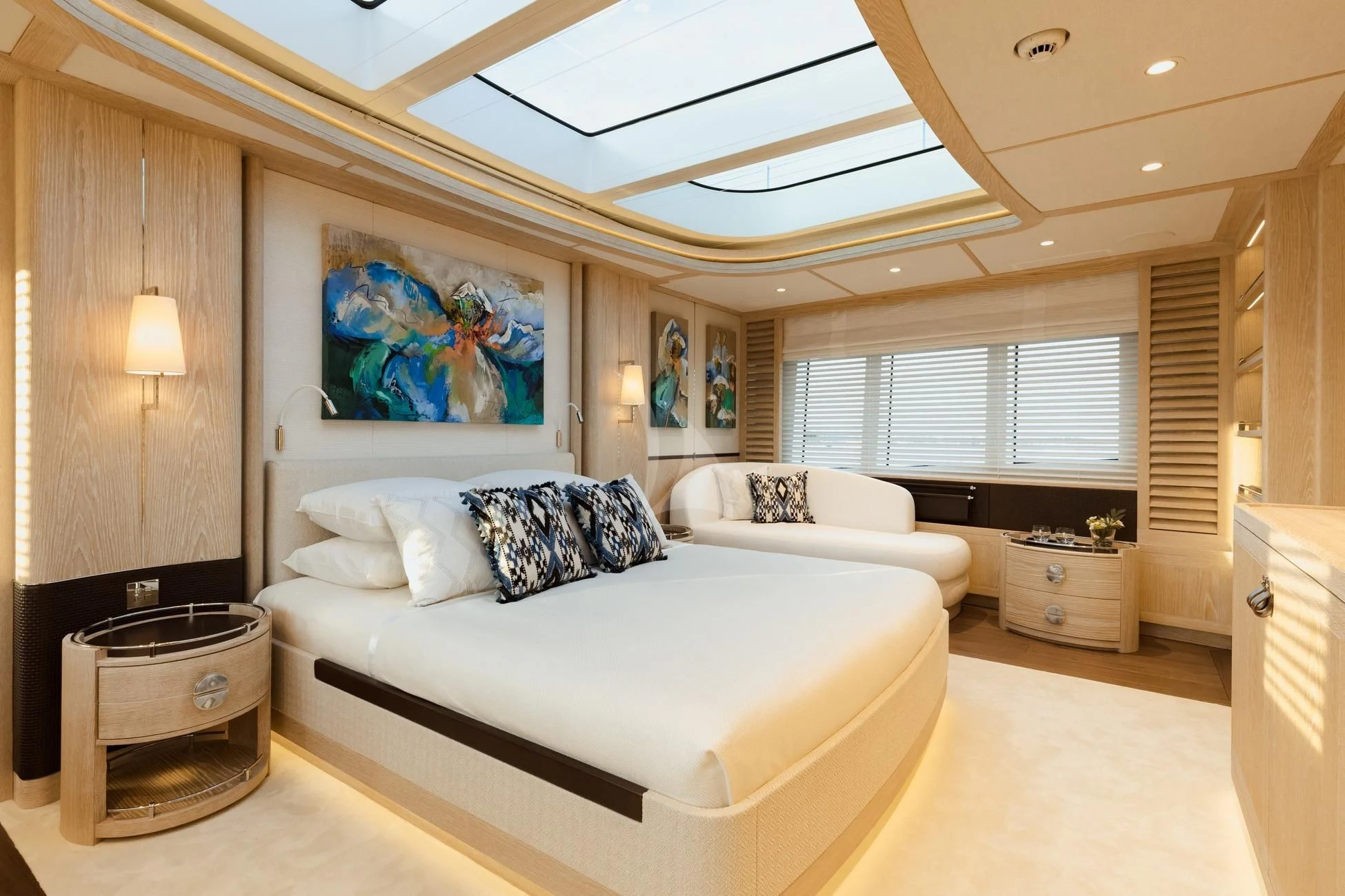 a large white bedroom with a large bed and a large window aboard CALYPSO I Yacht for Charter