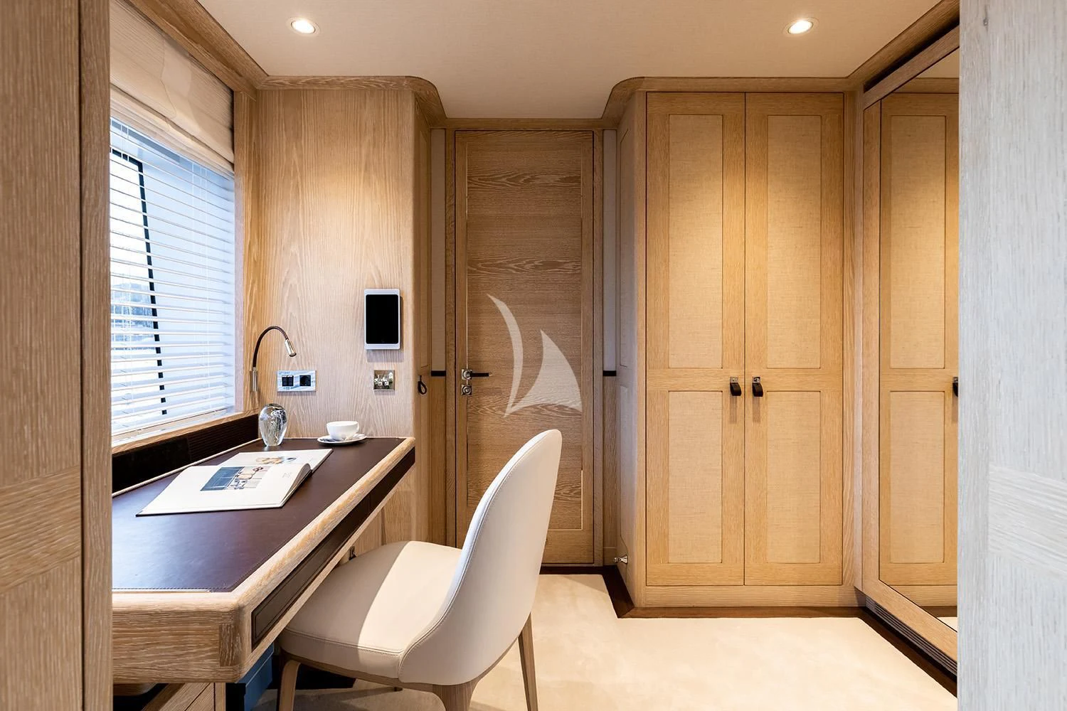 a room with a table and chairs aboard CALYPSO I Yacht for Charter