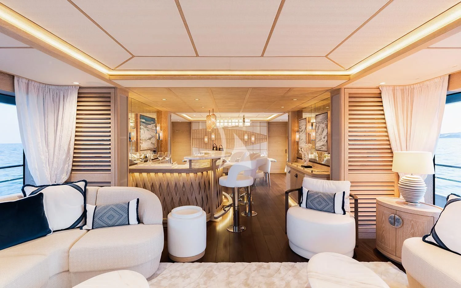 a living room with a large window aboard CALYPSO I Yacht for Charter