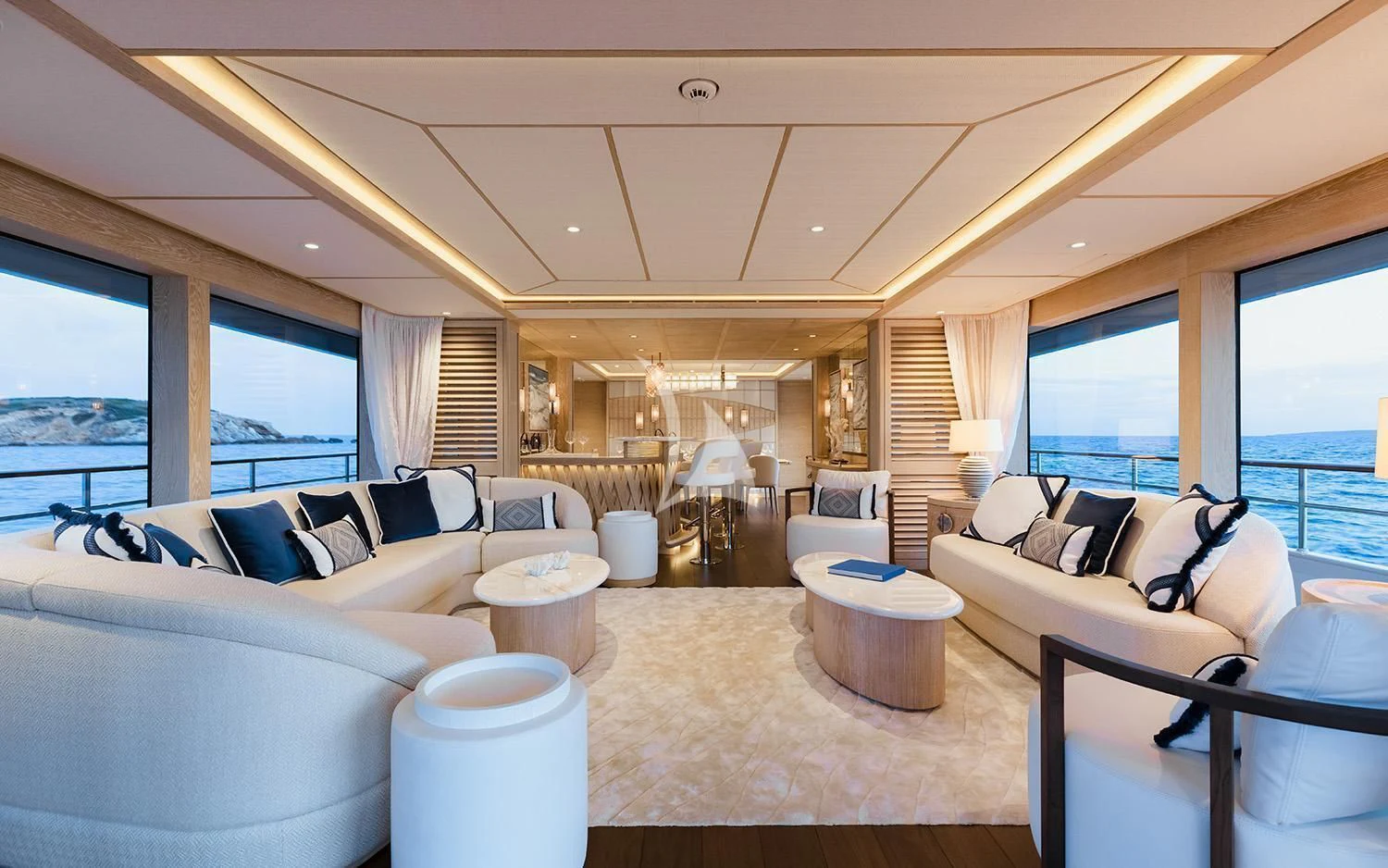 a living room with a large window aboard CALYPSO I Yacht for Charter