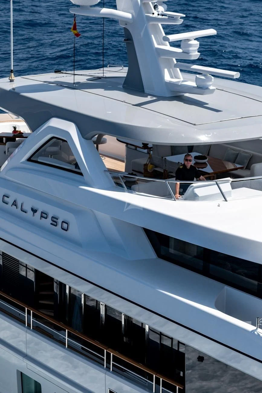 a person sitting on a boat aboard CALYPSO I Yacht for Charter