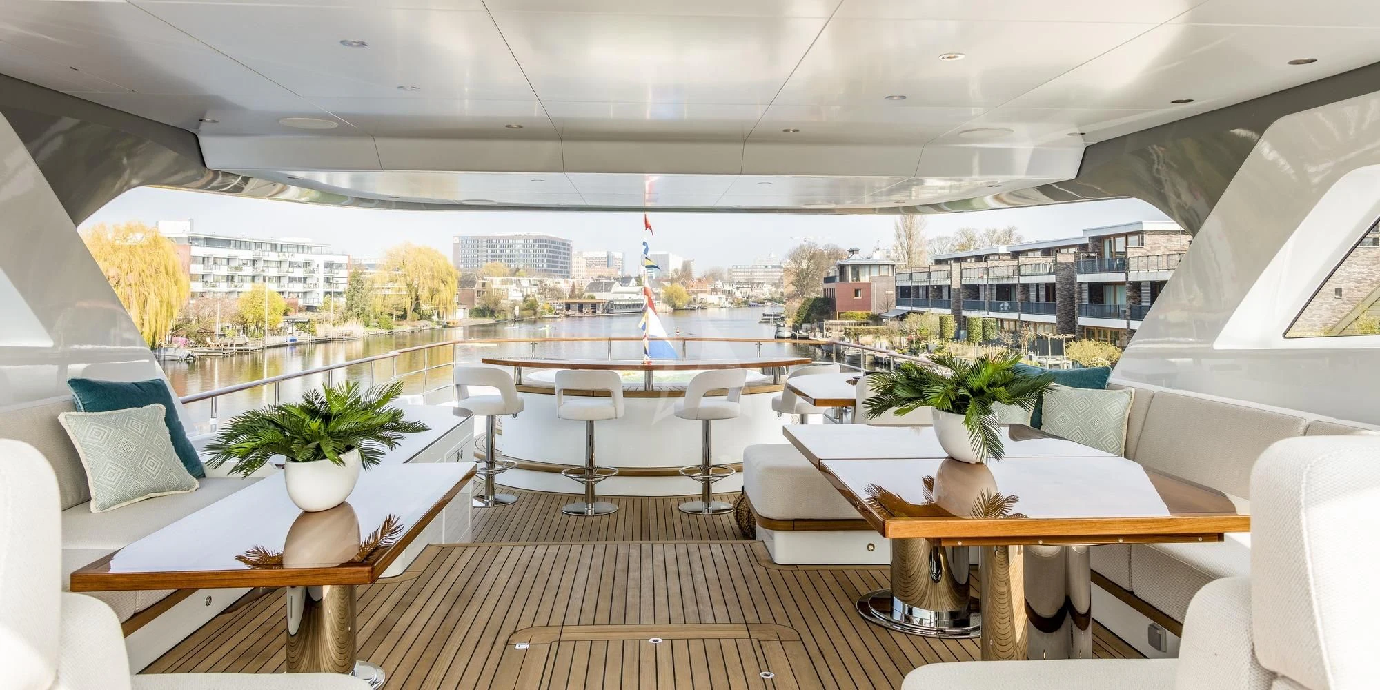 a room with tables and chairs aboard CALYPSO I Yacht for Charter