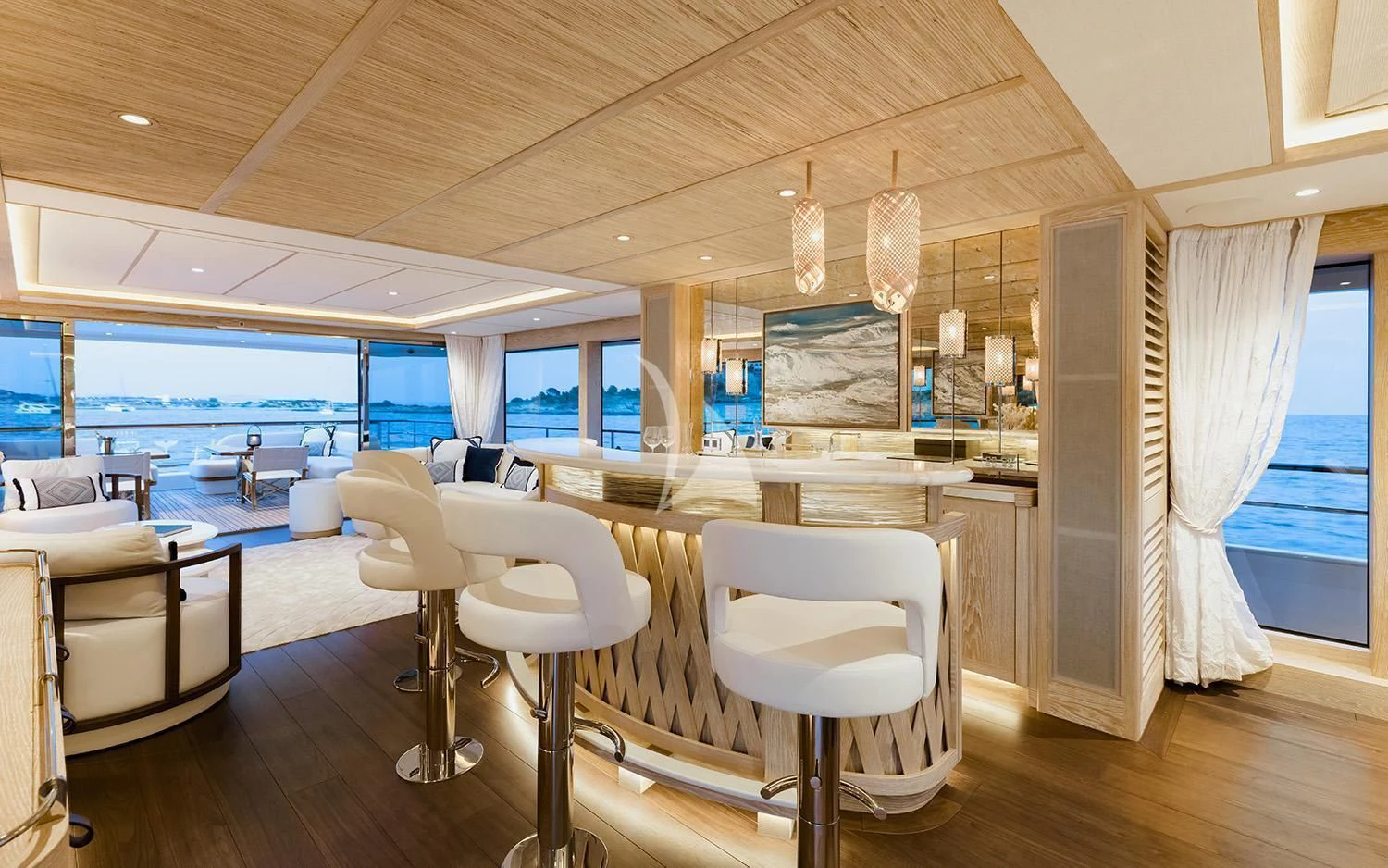 a room with tables and chairs aboard CALYPSO I Yacht for Charter