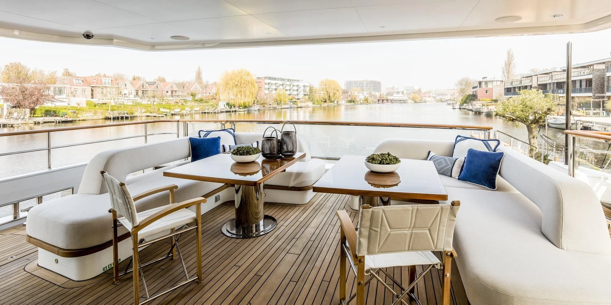 a table and chairs on a balcony aboard CALYPSO I Yacht for Charter