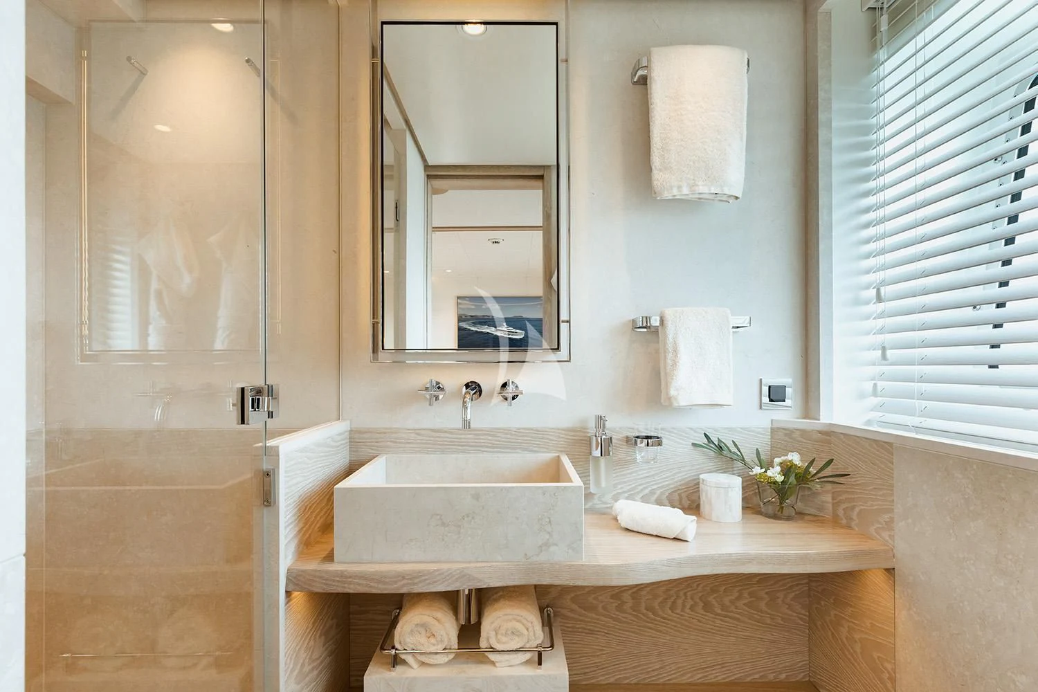 a bathroom with a large mirror aboard CALYPSO I Yacht for Charter