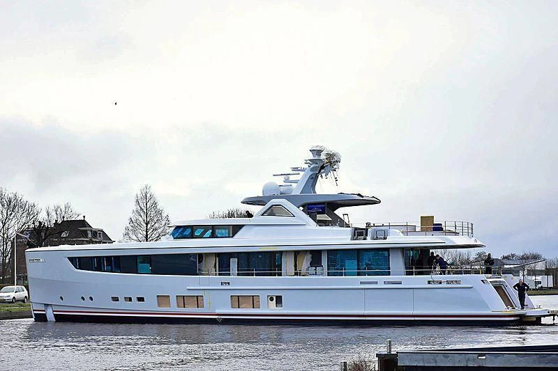 a large white boat on a river aboard CALYPSO I Yacht for Charter